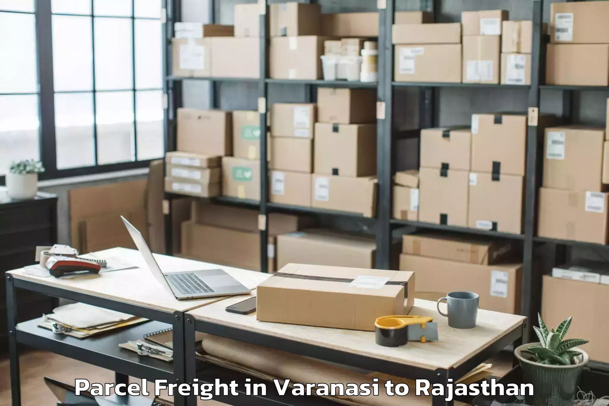 Easy Varanasi to Mandalgarh Parcel Freight Booking